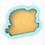 a cookie cutter shaped like a piece of bread