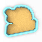 a cookie shaped like a piece of bread