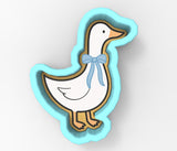 A cartoon-style duck wearing a blue bow tie.