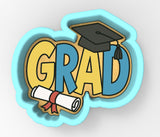a graduation cap and diploma scroll with the word grad on it