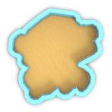 a cookie cutter with a cookie shaped like a map of africa