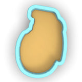 a cookie cutter with a cookie inside of it