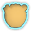 a cookie cutter shaped like a bear's head