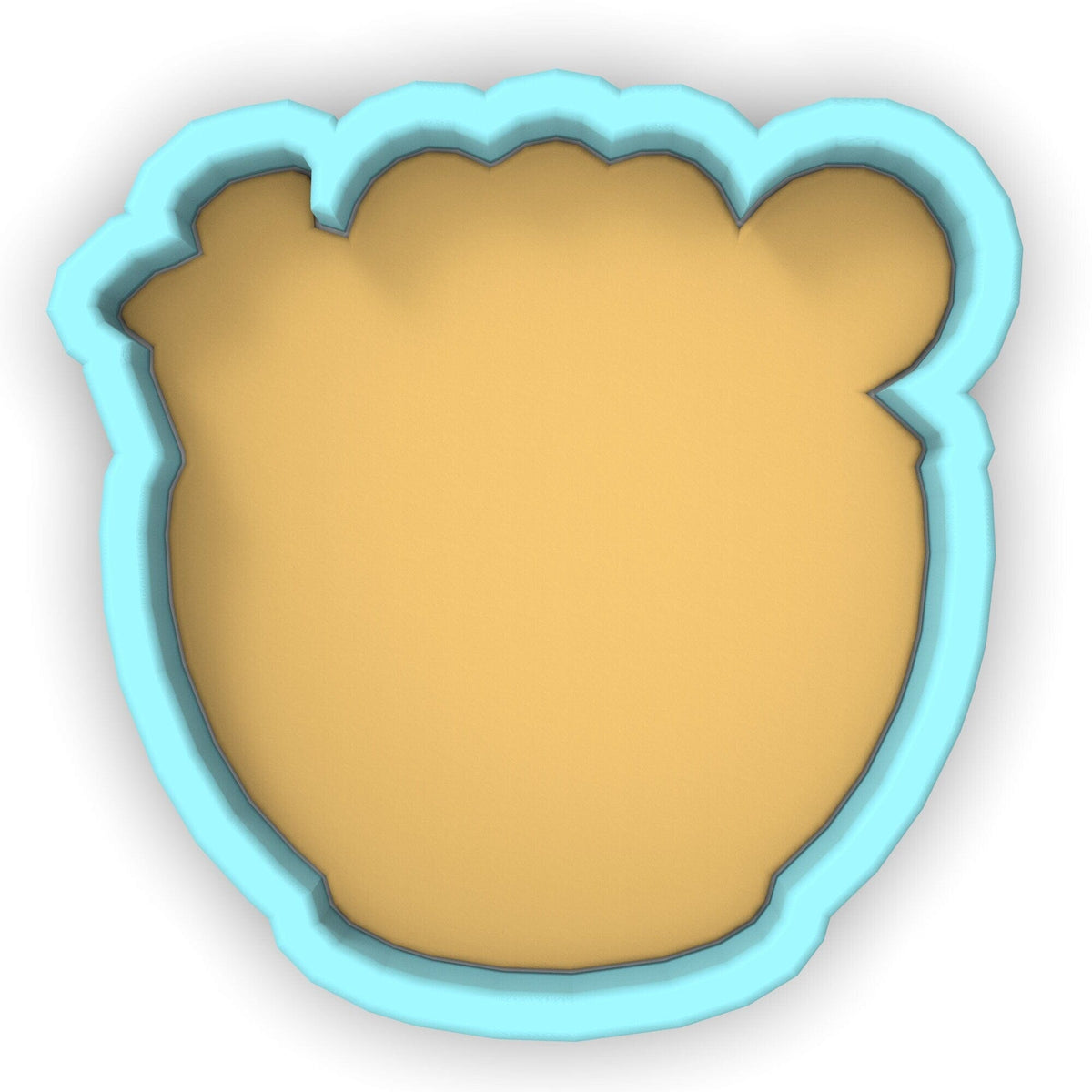 a cookie cutter shaped like a bear's head