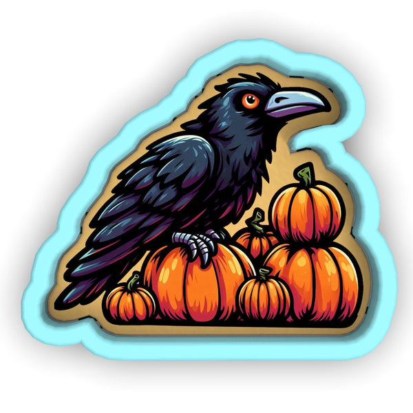 a black bird sitting on top of a pile of pumpkins