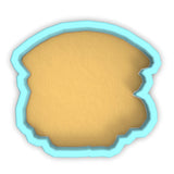 a cookie cutter cut out of the shape of a face