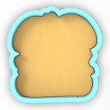 a cookie shaped like a piece of bread