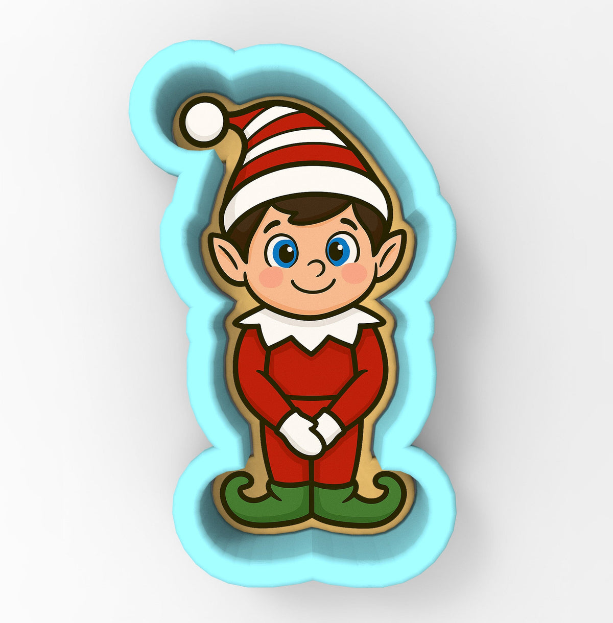 A cookie cutter in the shape of a cartoon elf wearing a red suit and a striped hat.