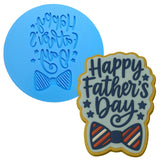 a cookie that says happy father&#39;s day and a cookie with a bow tie