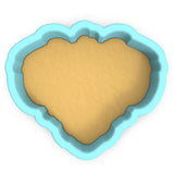 a cookie in the shape of a heart