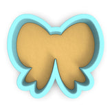 a cookie cutter shaped like a butterfly