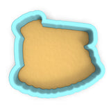 a cookie cutter shaped like a piece of bread