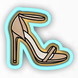 a pair of high heeled shoes with a high heel