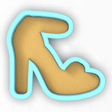 a high heeled shoe with a heart cut out of it