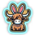 a sticker with a picture of a cow's head