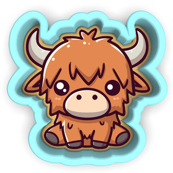 a sticker of a brown bull with horns