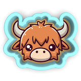 a sticker of a brown bull with horns