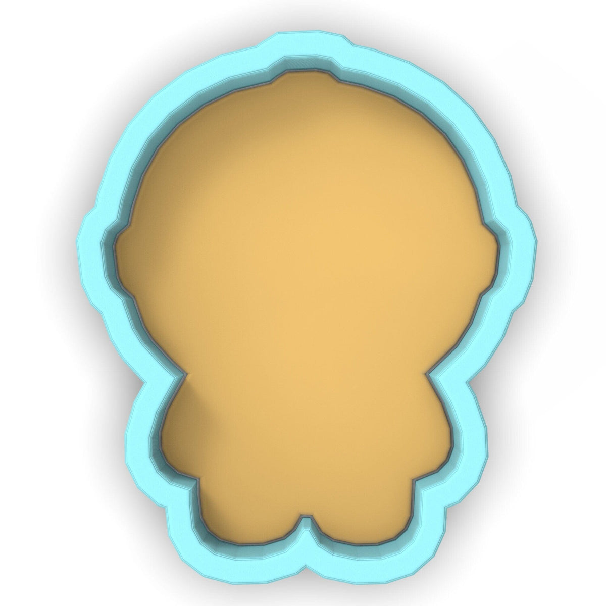 a cookie cutter with a cookie in the shape of a head
