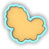 a cookie shaped like a cloud on a white background