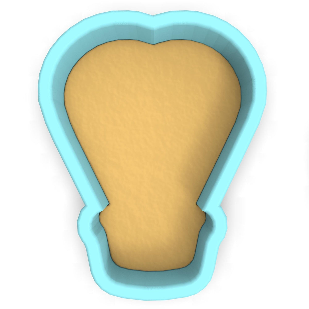 a cookie cutter with a cookie inside of it