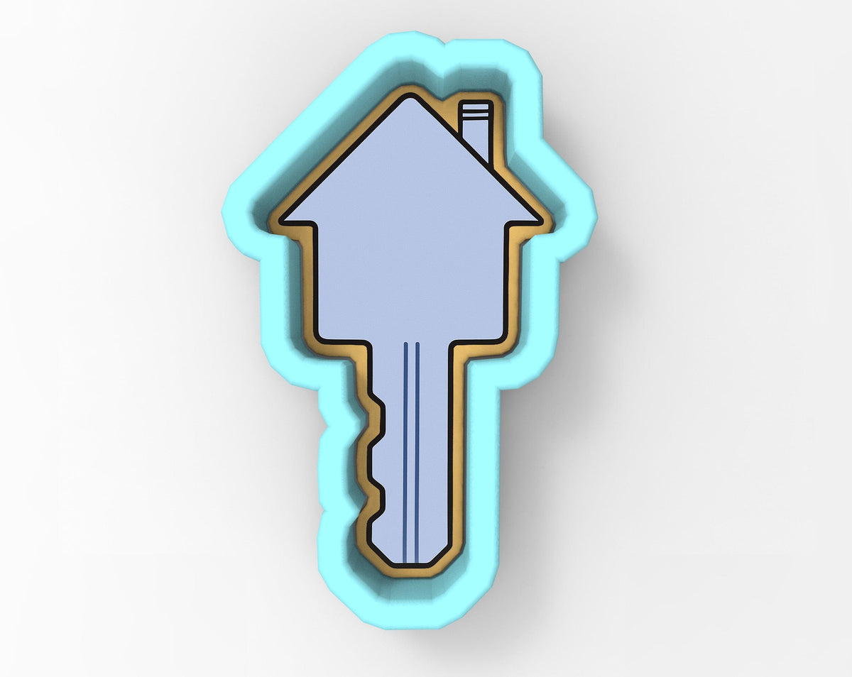 A key-shaped cookie cutter in a light blue color.