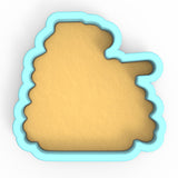a cookie cutter with a cookie in the shape of a hand
