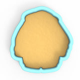 a cookie cutter with a cookie in the shape of a face