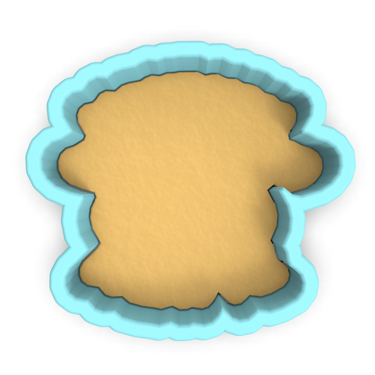 a cookie cutter with a cookie in the shape of a head