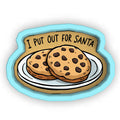 two cookies sitting on top of a white plate