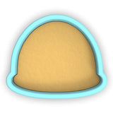 a cookie cutter with a cookie in the shape of a helmet