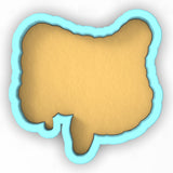 a cookie shaped like a human stomach