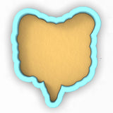 a cookie shaped like the shape of a heart