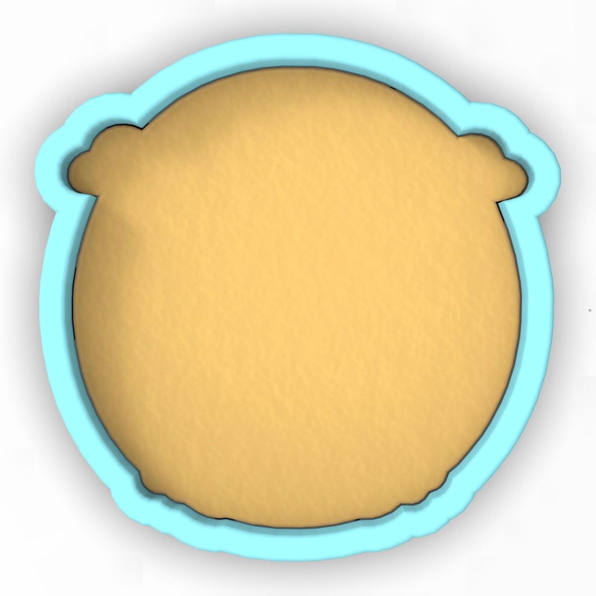 a cookie cutter with a cookie in the shape of a bear
