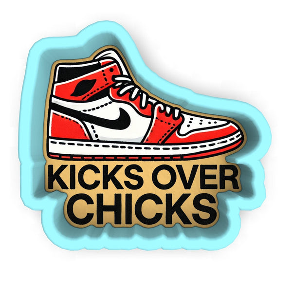 a sticker that says kicks over chicks