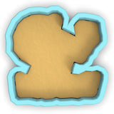 a cookie shaped like the letter k