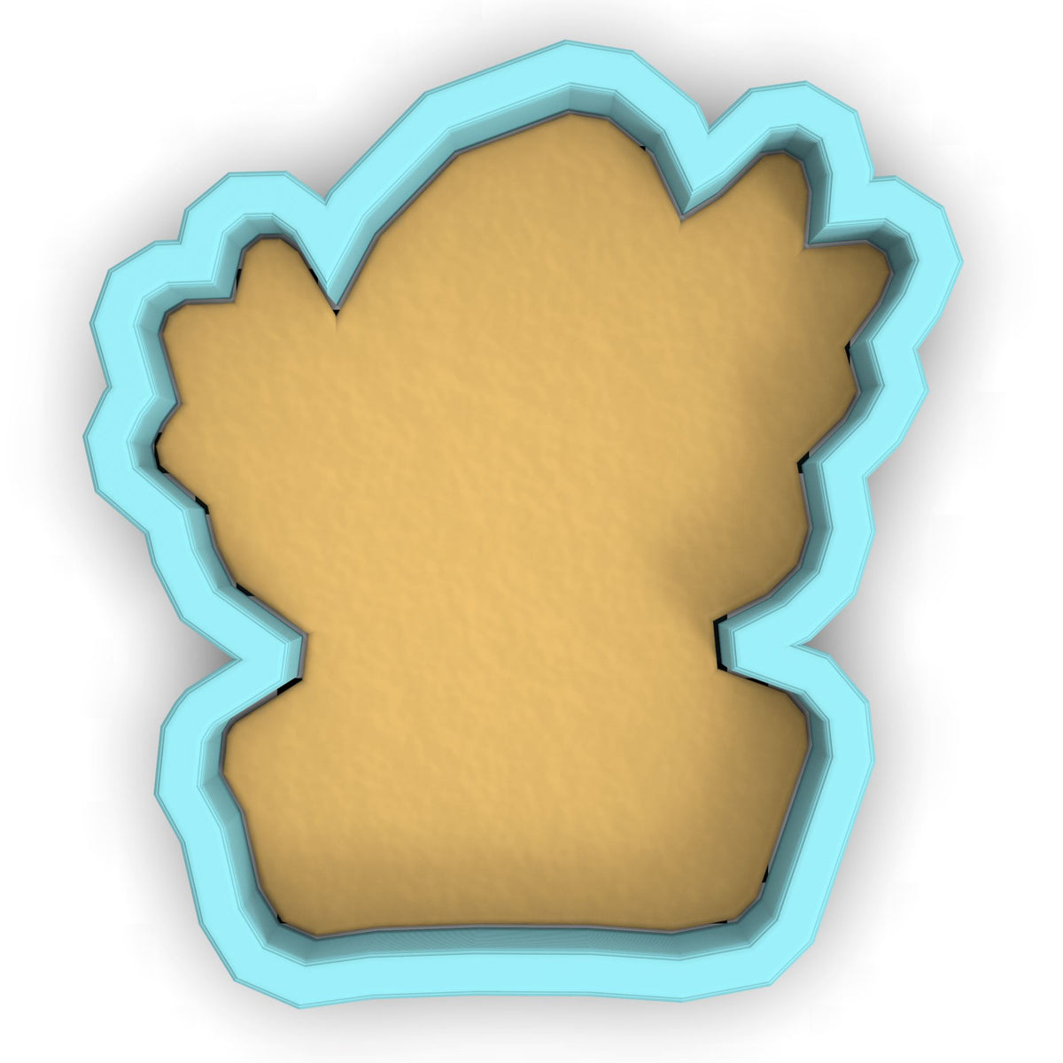a cookie cutter with a cookie shaped like a bear