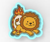 a lion sticker sitting on top of a blue sticker