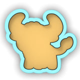 a cookie shaped like a teddy bear on a white background