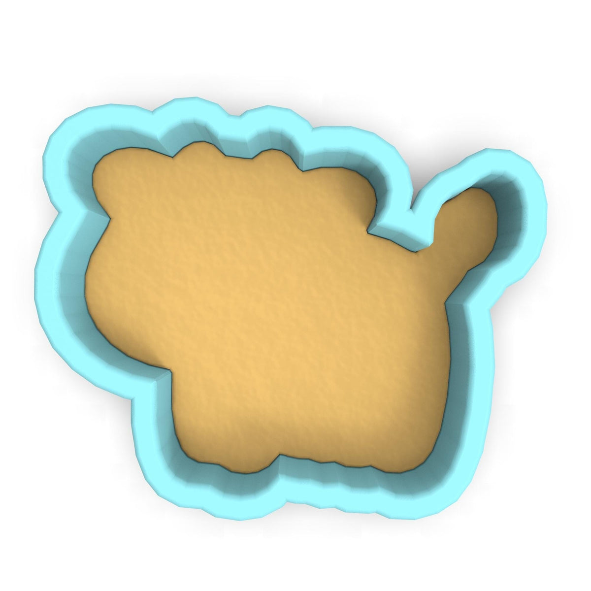 a cookie cutter with a cookie shaped like a bear