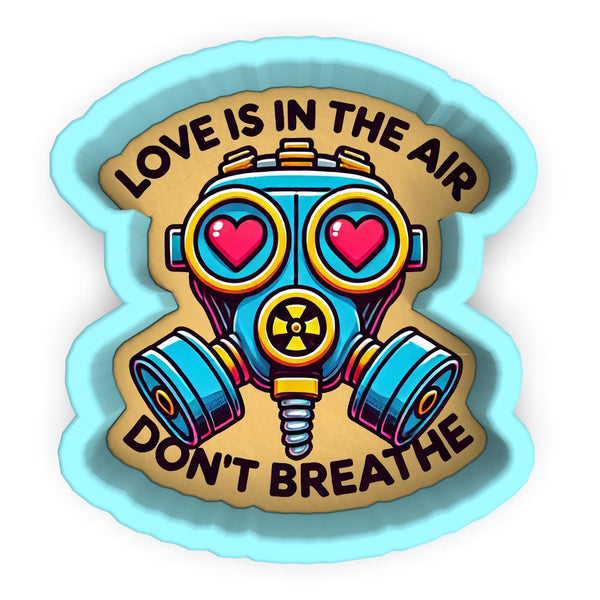 a sticker that says love is in the air don't breathe