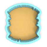 a cookie cutter with a cookie in the shape of a cookie