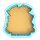 a cookie cutter with a cookie in the shape of a cookie