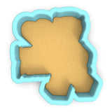 a cookie cutter shaped like the shape of the letter k