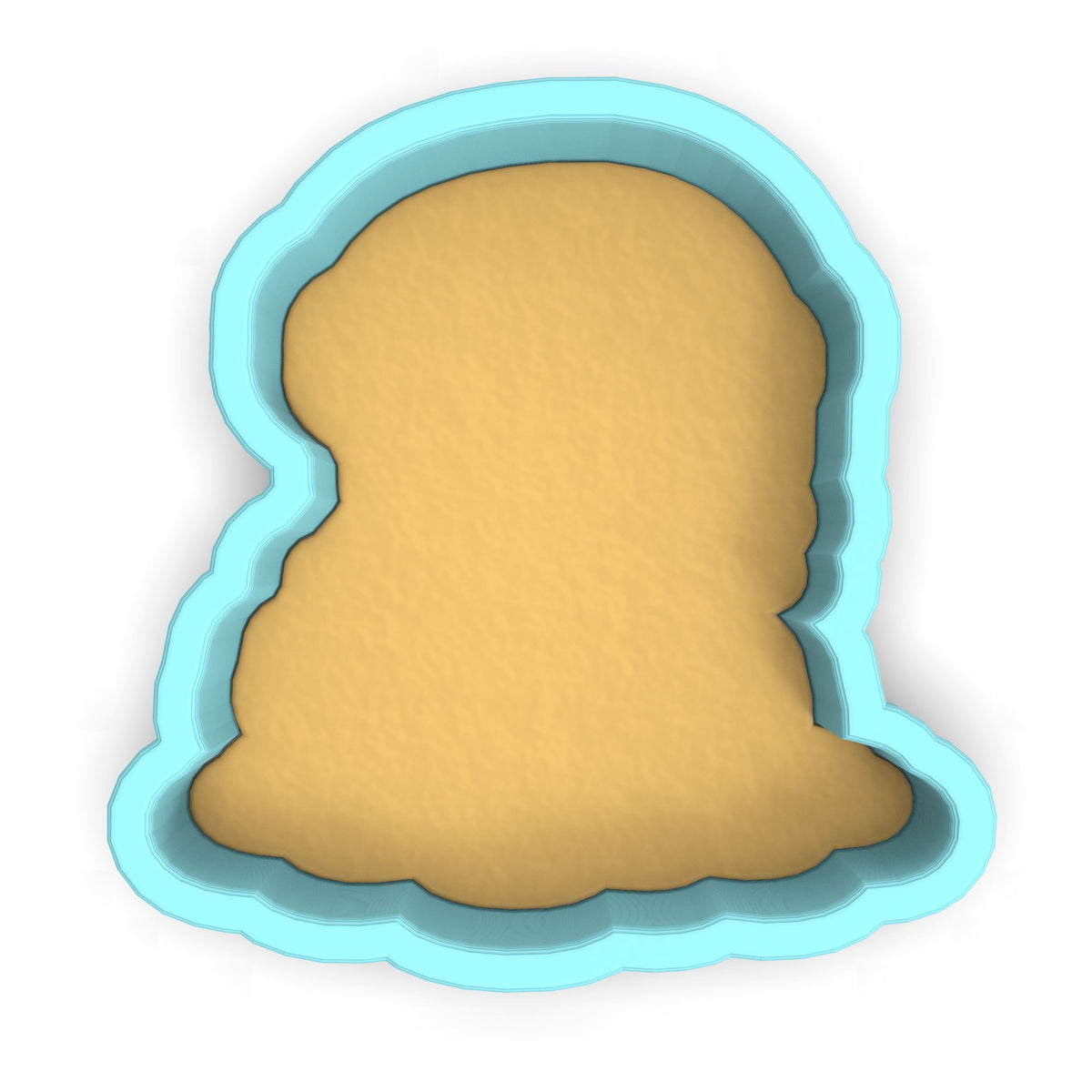 a cookie cutter with a cookie in the shape of a face