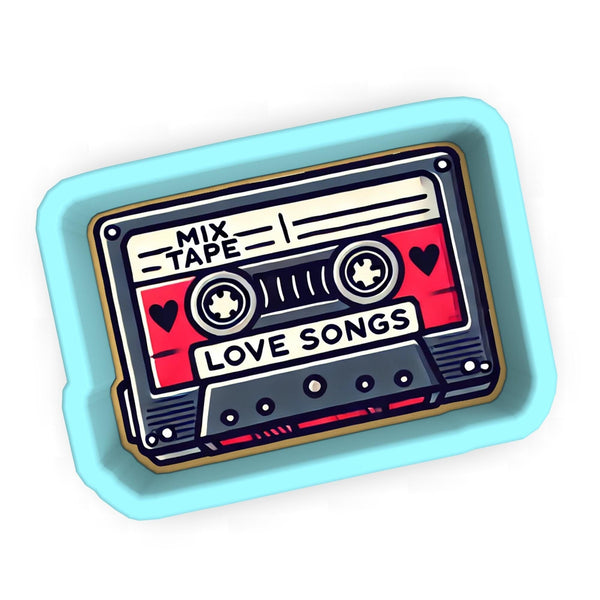 a sticker of a cassette with the words love songs on it