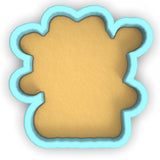 a cookie shaped like a teddy bear on a white background