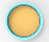 A blue bowl filled with a yellow substance, possibly a sauce or batter, is shown in the image.