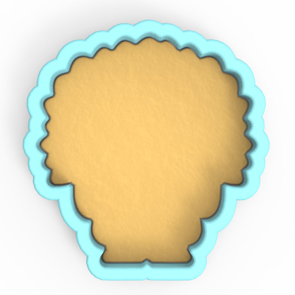 a cookie cutter with a cookie in the shape of a head