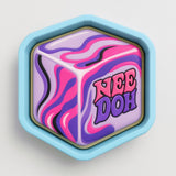 A colorful, abstract cube-shaped object with a textured surface in shades of purple, pink, and blue.