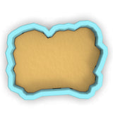 a cookie cutter shaped like a frame on a white background